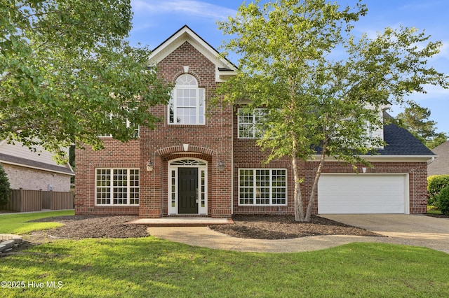 1113 Foxbow Cv, Leland, NC 28451 - view of front of property with brick siding, concrete driveway, and a garage
