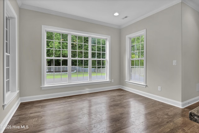 1113 Foxbow Cv, Leland, NC 28451 - spare room with plenty of natural light, baseboards, dark wood-type flooring, ornamental molding, and recessed lighting