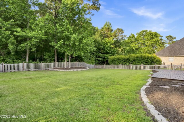 1113 Foxbow Cv, Leland, NC 28451 - view of yard featuring a wooden deck
