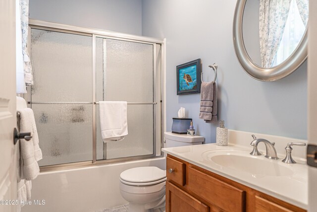 31 Pinewild Dr, Pinehurst, NC 28374 - full bath featuring bath / shower combo with glass door, toilet, and vanity