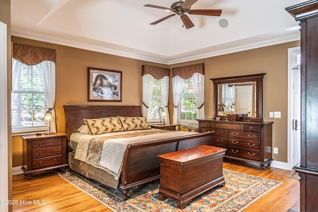 31 Pinewild Dr, Pinehurst, NC 28374 - bedroom with light wood-style floors, ornamental molding, baseboards, and a ceiling fan