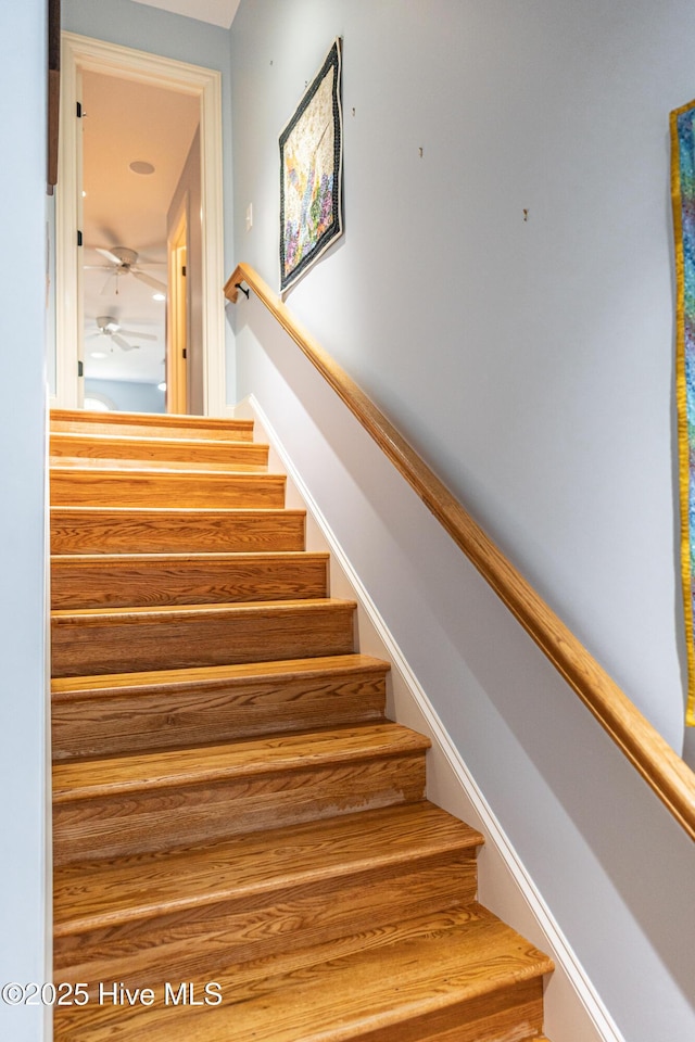 31 Pinewild Dr, Pinehurst, NC 28374 - staircase with a ceiling fan