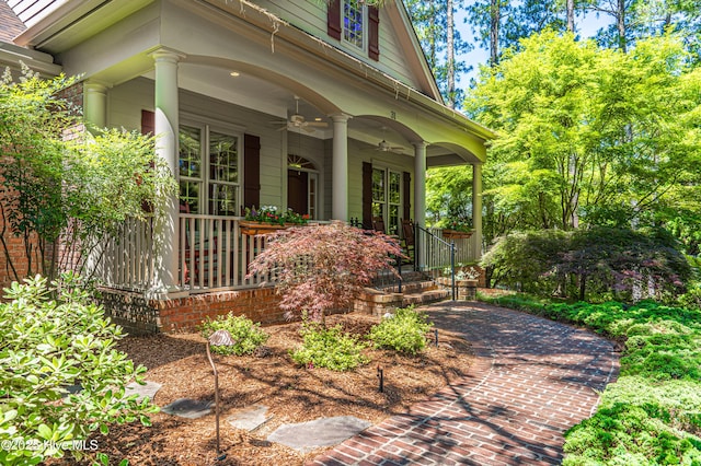 31 Pinewild Dr, Pinehurst, NC 28374 - property entrance with covered porch and a ceiling fan