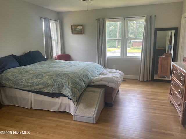 405 E Westbrook St, Wallace, NC 28466 - bedroom with light wood finished floors and baseboards