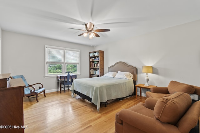 405 E Westbrook St, Wallace, NC 28466 - bedroom with light wood-style flooring, baseboards, and a ceiling fan