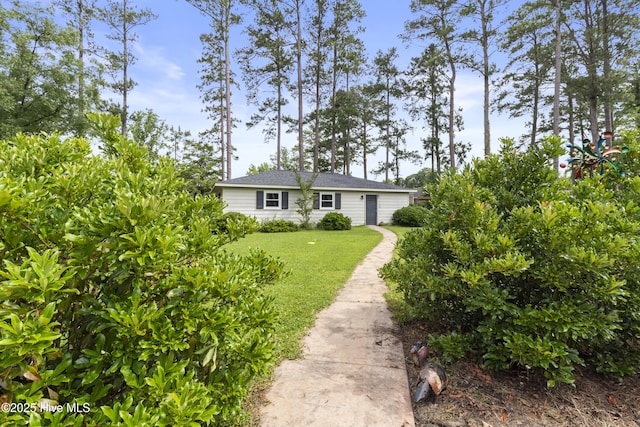 405 E Westbrook St, Wallace, NC 28466 - view of front of home with a front lawn