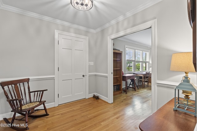 405 E Westbrook St, Wallace, NC 28466 - living area with light wood-style floors, ornamental molding, and baseboards