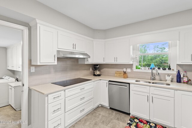 405 E Westbrook St, Wallace, NC 28466 - kitchen featuring dishwasher, a sink, independent washer and dryer, under cabinet range hood, and black electric cooktop