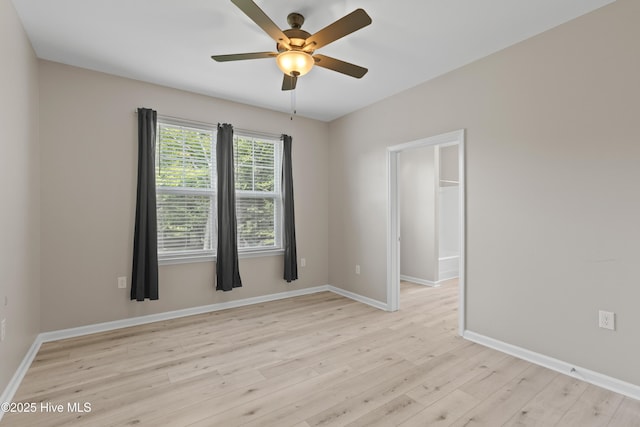 218 Spring Dr, Jacksonville, NC 28540 - unfurnished room with ceiling fan, light wood-style floors, and baseboards