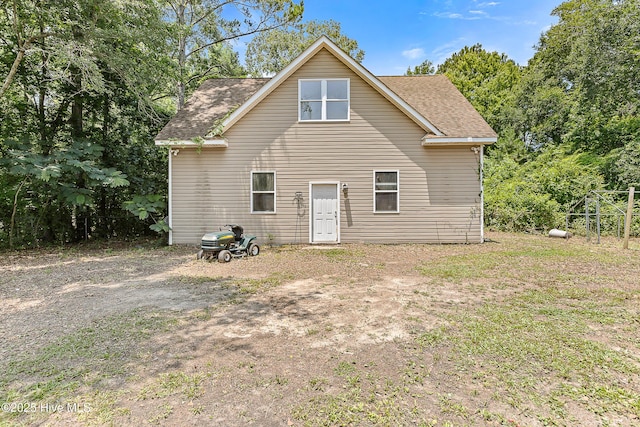 218 Spring Dr, Jacksonville, NC 28540 - rear view of property featuring a shingled roof