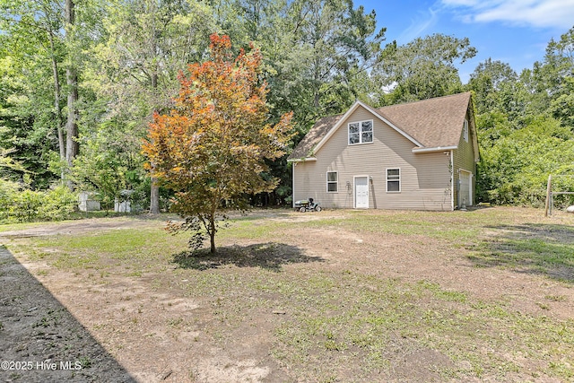 218 Spring Dr, Jacksonville, NC 28540 - view of home's exterior with roof with shingles