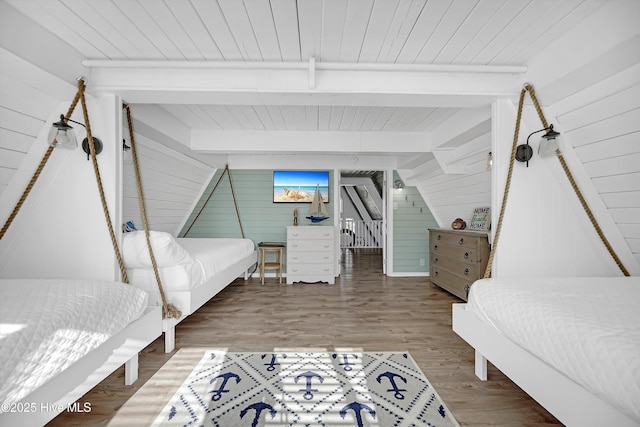 202 E 2nd St, Ocean Isle Beach, NC 28469 - bedroom featuring wood walls, wooden ceiling, and wood finished floors