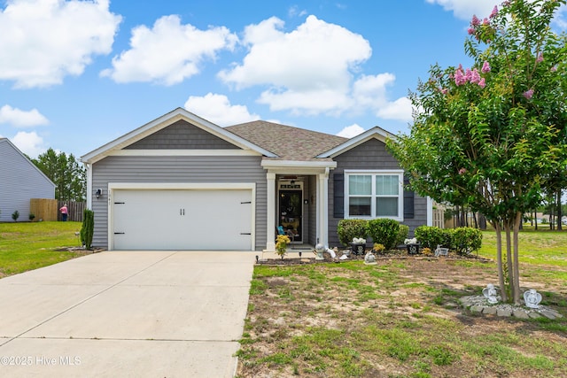 1041 S Fisher King Dr SE, Bolivia, NC 28422 - view of front of house with an attached garage and concrete driveway