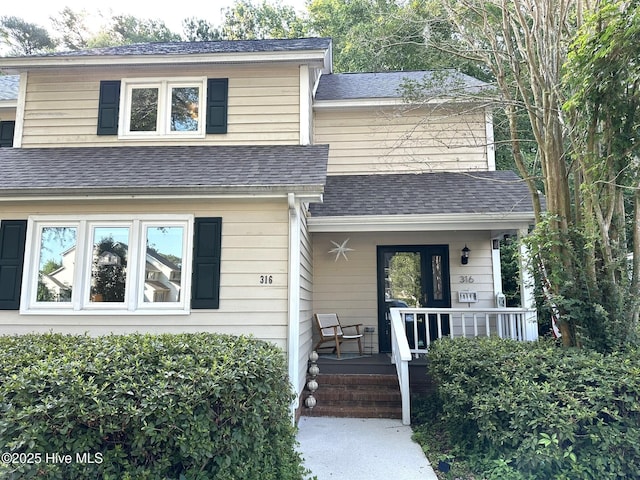 316 Wimbledon Ct, Wilmington, NC 28412 - view of front of home featuring covered porch and roof with shingles