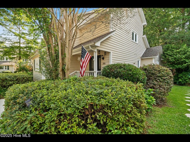 316 Wimbledon Ct, Wilmington, NC 28412 - bedroom featuring carpet, a textured ceiling, fridge, and a ceiling fan