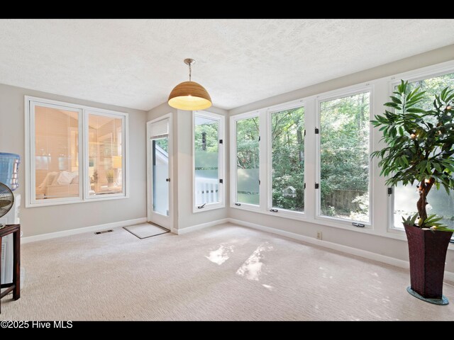 316 Wimbledon Ct, Wilmington, NC 28412 - bedroom with carpet, a textured ceiling, and baseboards