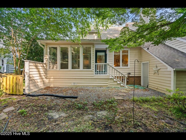 316 Wimbledon Ct, Wilmington, NC 28412 - bedroom with light carpet, baseboards, a textured ceiling, ceiling fan, and ensuite bath