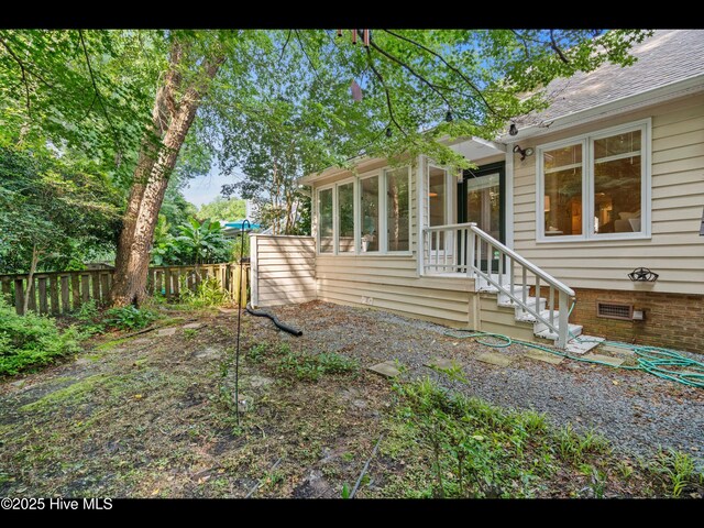316 Wimbledon Ct, Wilmington, NC 28412 - bedroom featuring a textured ceiling, light colored carpet, baseboards, and a ceiling fan