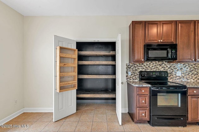 127 Moonstone Ct, Jacksonville, NC 28546 - kitchen with black appliances, baseboards, backsplash, light tile patterned flooring, and stone countertops