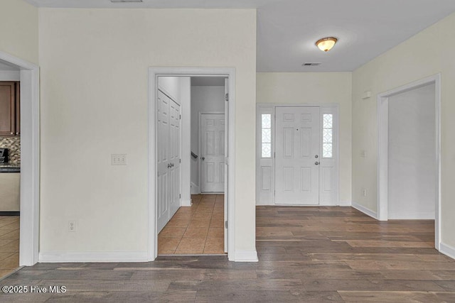127 Moonstone Ct, Jacksonville, NC 28546 - entryway featuring wood finished floors and baseboards