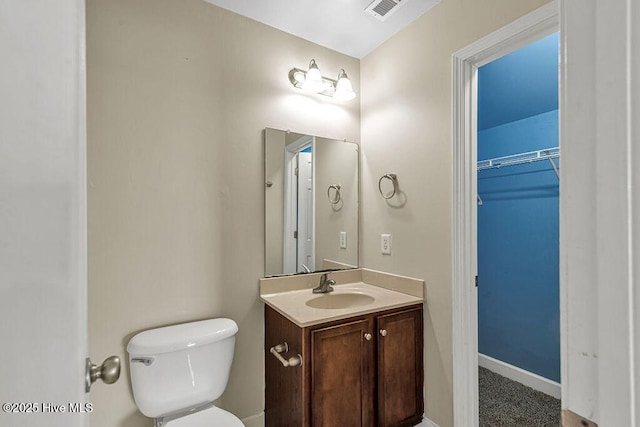 127 Moonstone Ct, Jacksonville, NC 28546 - half bath with vanity, toilet, and baseboards