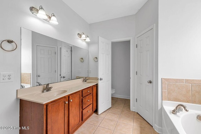 127 Moonstone Ct, Jacksonville, NC 28546 - full bathroom with double vanity, a bath, a closet, and tile patterned flooring