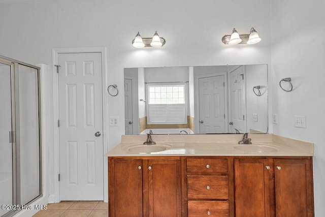 127 Moonstone Ct, Jacksonville, NC 28546 - full bath featuring tile patterned flooring, a stall shower, double vanity, and a closet