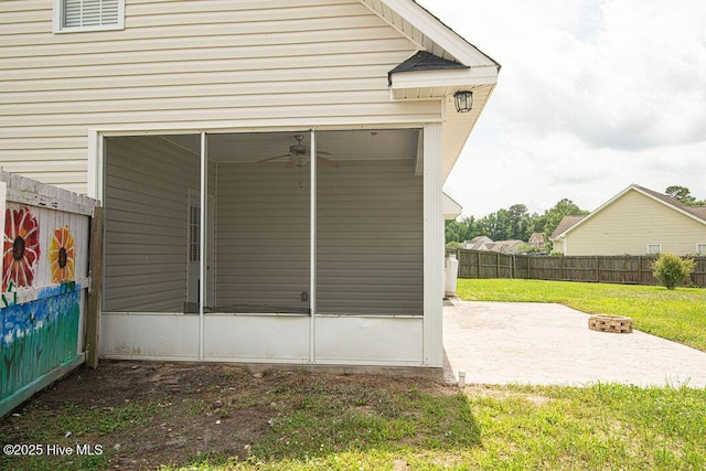 127 Moonstone Ct, Jacksonville, NC 28546 - view of side of home featuring a patio, an outdoor fire pit, a sunroom, and a ceiling fan