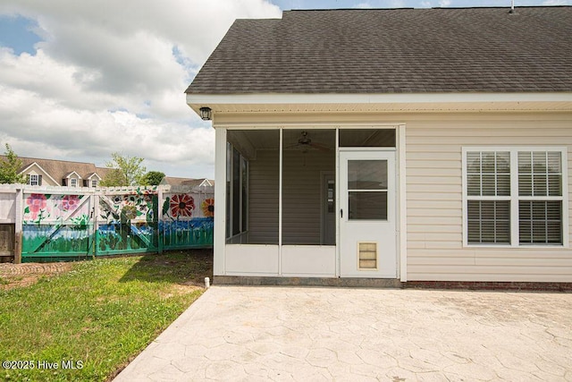 127 Moonstone Ct, Jacksonville, NC 28546 - view of exterior entry featuring roof with shingles and a patio area