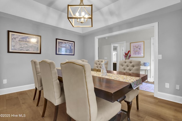 2122 Airlie Brook Dr, Wilmington, NC 28403 - dining space featuring a chandelier and wood-type flooring