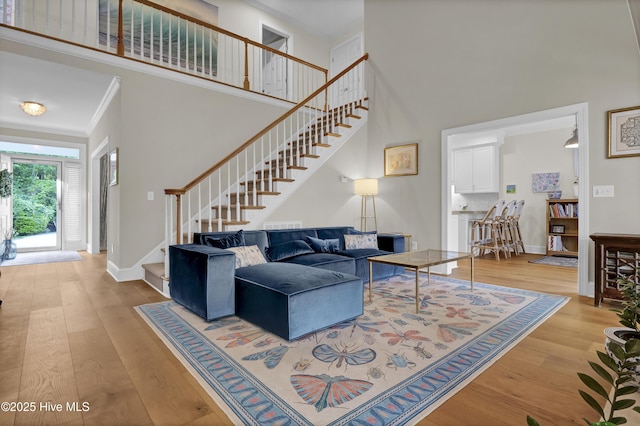 2122 Airlie Brook Dr, Wilmington, NC 28403 - living area with stairway, a high ceiling, and wood finished floors