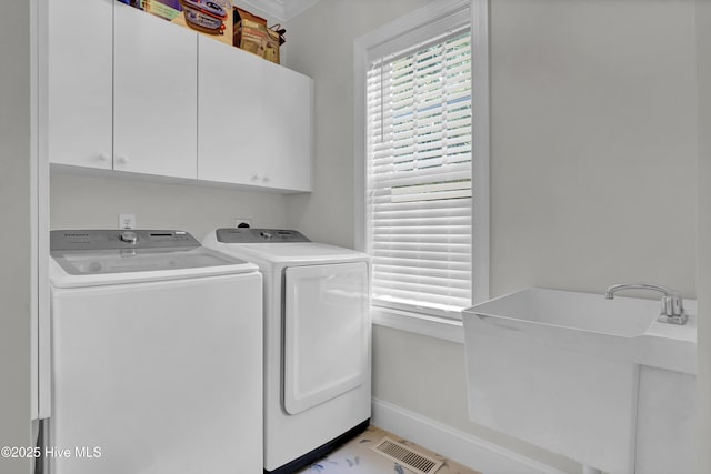 2122 Airlie Brook Dr, Wilmington, NC 28403 - washroom with cabinet space, washer and dryer, and crown molding