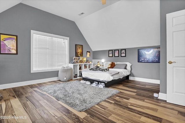 2122 Airlie Brook Dr, Wilmington, NC 28403 - bedroom featuring vaulted ceiling, wood finished floors, and a ceiling fan