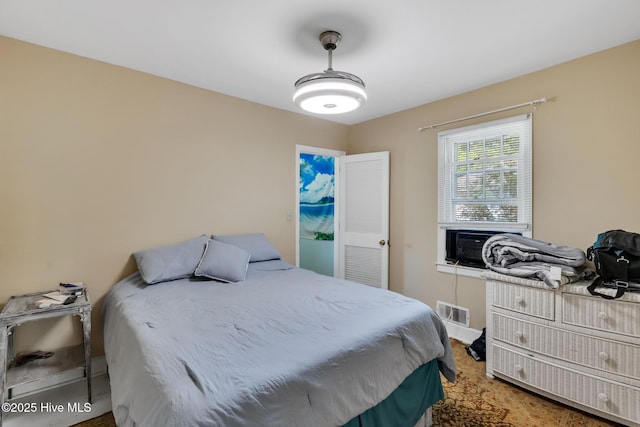 601 Mary Ann Dr, Hampstead, NC 28443 - bedroom with cooling unit and light carpet