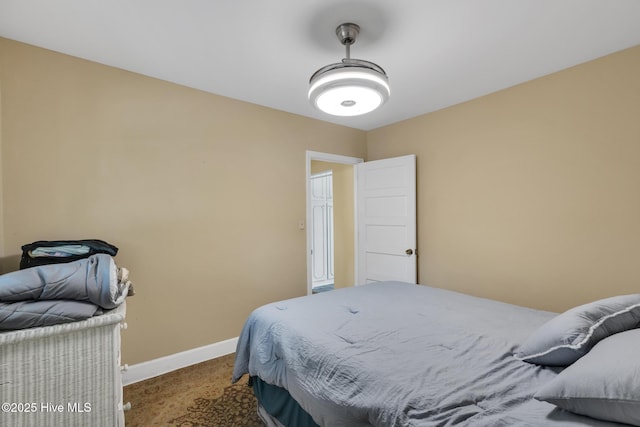 601 Mary Ann Dr, Hampstead, NC 28443 - carpeted bedroom with baseboards