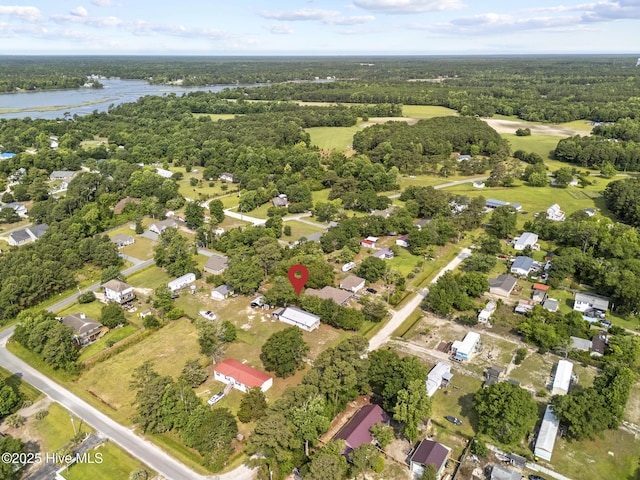 601 Mary Ann Dr, Hampstead, NC 28443 - aerial view of property and surrounding area featuring a large body of water and a heavily wooded area