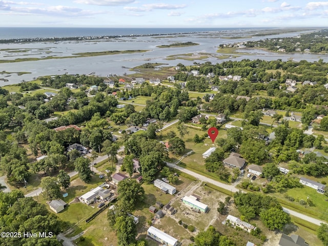 601 Mary Ann Dr, Hampstead, NC 28443 - aerial view of property and surrounding area with a large body of water and nearby suburban area