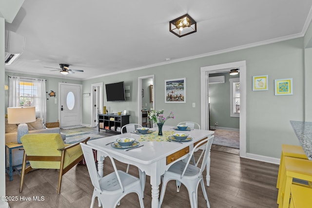 208 Hamlet Ave, Carolina Beach, NC 28428 - dining space featuring a ceiling fan, an AC wall unit, baseboards, dark wood-style floors, and crown molding