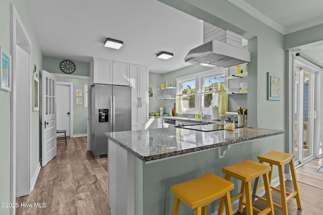 208 Hamlet Ave, Carolina Beach, NC 28428 - kitchen featuring stainless steel fridge with ice dispenser, open shelves, dark stone countertops, a peninsula, and white cabinetry