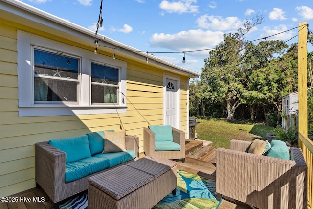 208 Hamlet Ave, Carolina Beach, NC 28428 - deck with an outdoor hangout area and area for grilling