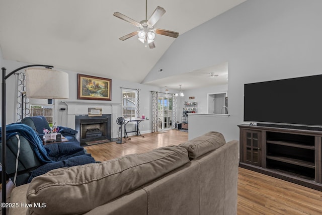 2902 Brems Battery, New Bern, NC 28562 - living room featuring ceiling fan, wood finished floors, a fireplace with flush hearth, and high vaulted ceiling