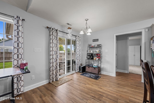 2902 Brems Battery, New Bern, NC 28562 - dining area with a chandelier and wood finished floors