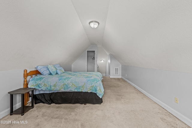 2902 Brems Battery, New Bern, NC 28562 - carpeted bedroom featuring baseboards and vaulted ceiling