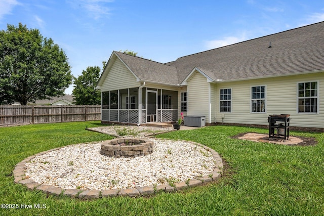 2902 Brems Battery, New Bern, NC 28562 - back of house with an outdoor fire pit, a sunroom, roof with shingles, and a patio area