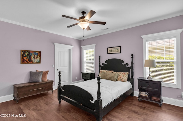 414 Wilson Ave, Carolina Beach, NC 28428 - bedroom with wood finished floors, crown molding, and ceiling fan