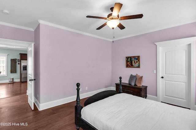 414 Wilson Ave, Carolina Beach, NC 28428 - bedroom with ornamental molding, dark wood-type flooring, stainless steel fridge with ice dispenser, and a ceiling fan