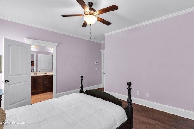 414 Wilson Ave, Carolina Beach, NC 28428 - bedroom featuring crown molding, connected bathroom, ceiling fan, and light wood-style flooring