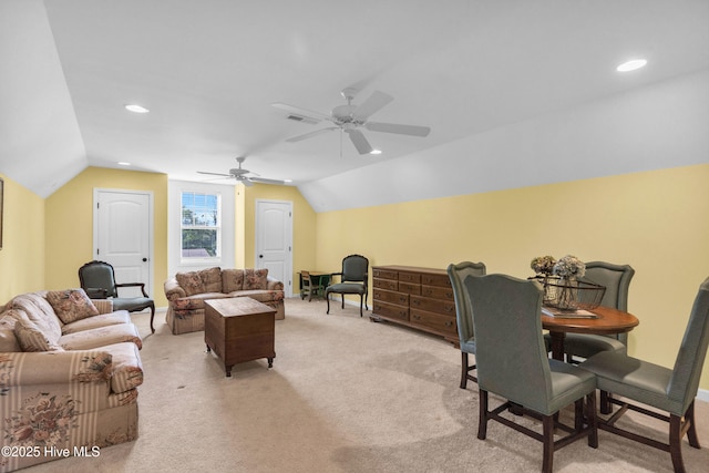 414 Wilson Ave, Carolina Beach, NC 28428 - living room with lofted ceiling, light carpet, ceiling fan, and recessed lighting