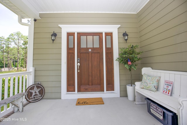 305 3rd St, Aberdeen, NC 28315 - view of exterior entry with a porch
