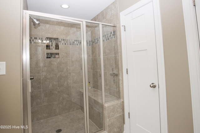 305 3rd St, Aberdeen, NC 28315 - bathroom with a stall shower and recessed lighting